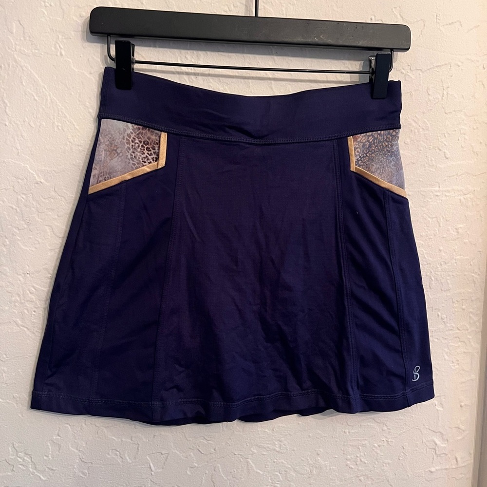 Ladies Sofibella golf Skort with Animal Print Pockets